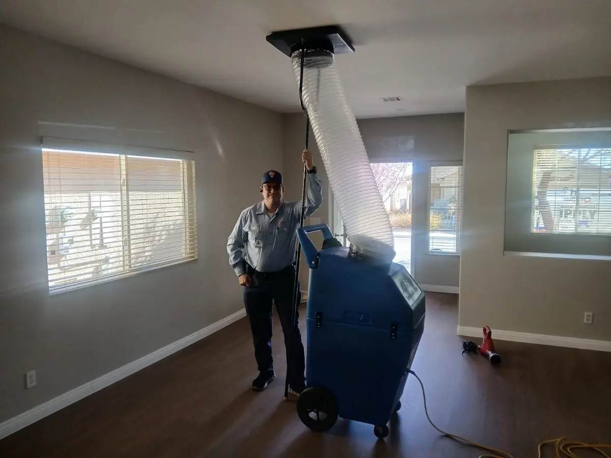 Professional Dryer Vent Cleaning work inside a Oakland home